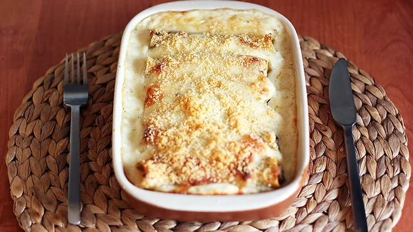 Фаршированные каннеллони под соусом бешамель